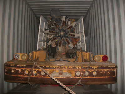 Export Logistics & Shipping, Inc. uses cube container to internationally ship Kawasaki 115Z wheel loader